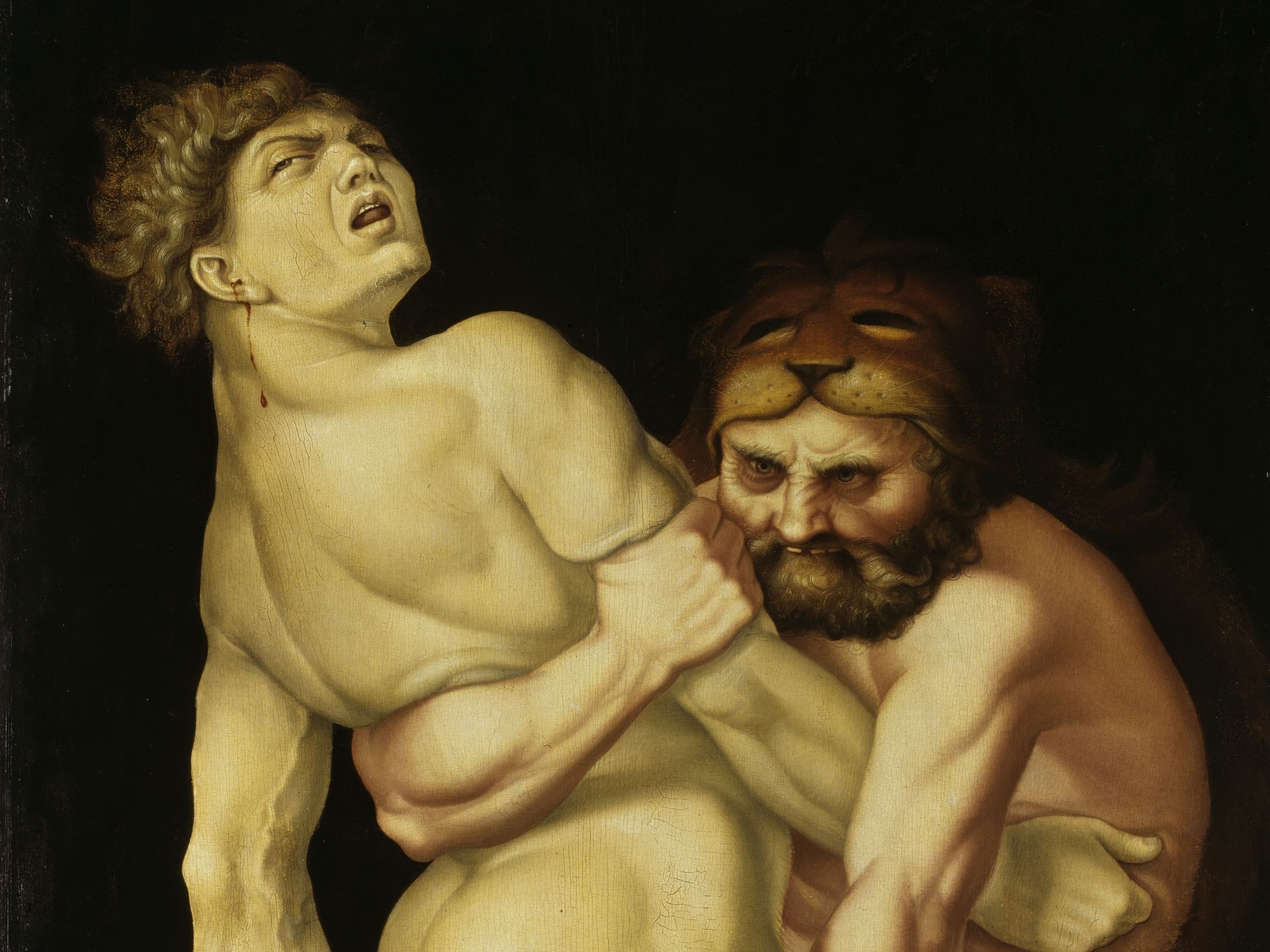 A muscular man in a lion skin grapples with another man, both with intense expressions, set against a dark background.